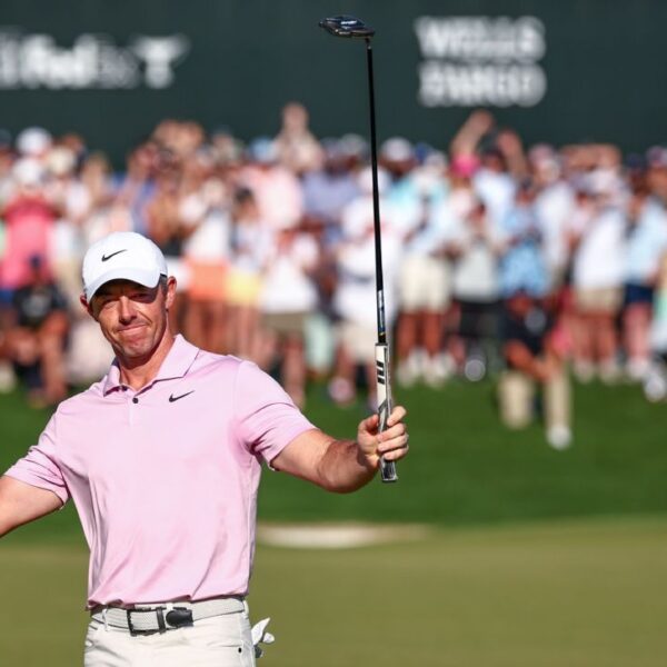 Rory closes with 65, wins record 4th Wells Fargo